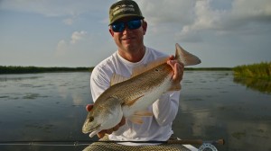 Man is smiling after a successful catch