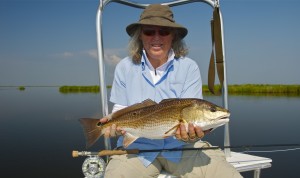 The smile of a winner after catching a fish