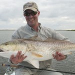 Man has a delightful look after catching a fish