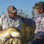 Man congratulates his partner on a good catch