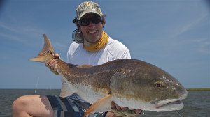 Delight in the face after catching a fish