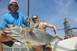 Two men delighted at their catch