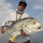 Man posing with the fish he just caught