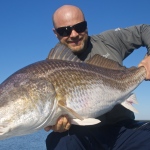 Shallow south's largest redfish caught on fly. Thirty seven pounds